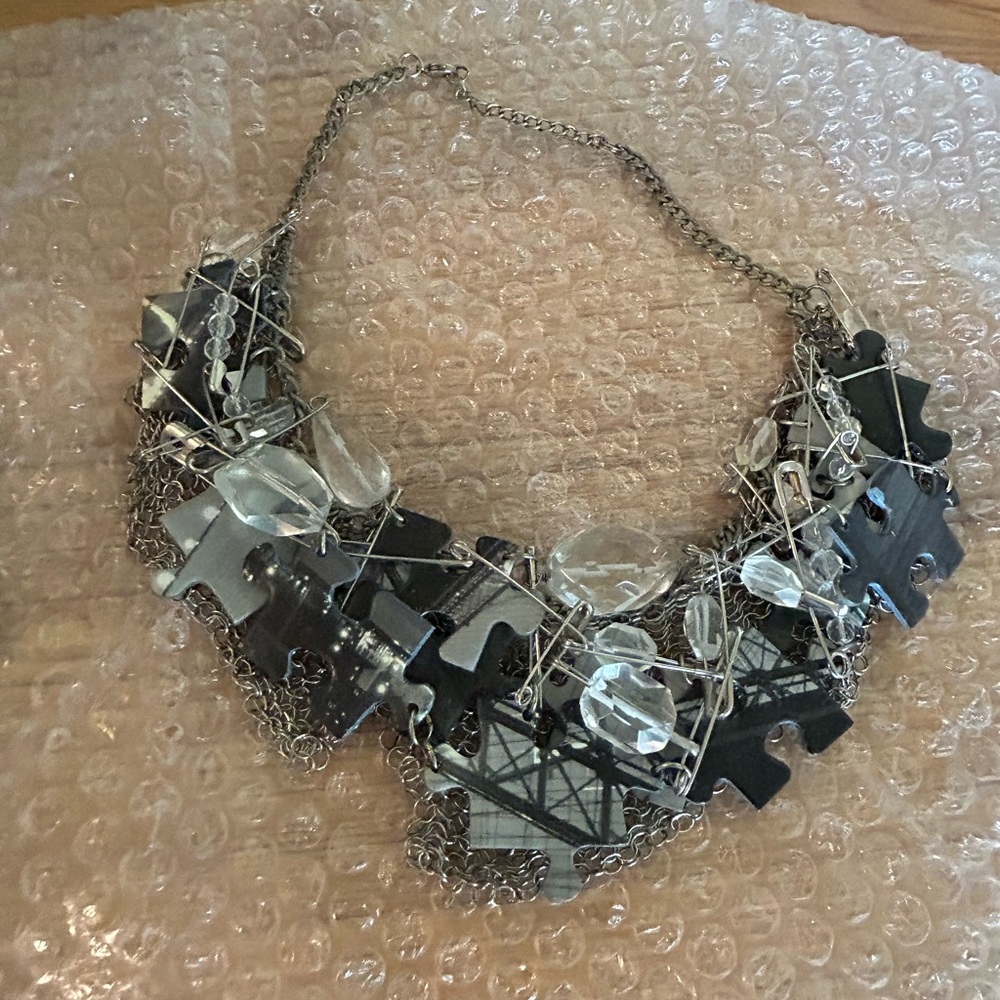 Realm by Jesse Walker Brooklyn bridge puzzle necklace